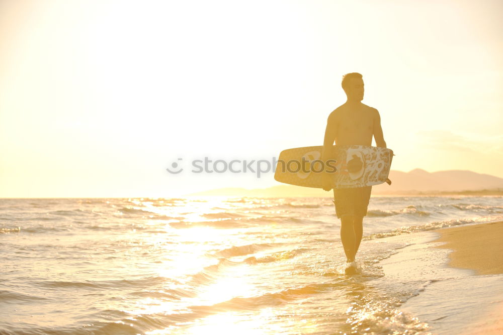 Similar – Man with skateboard looking at sea