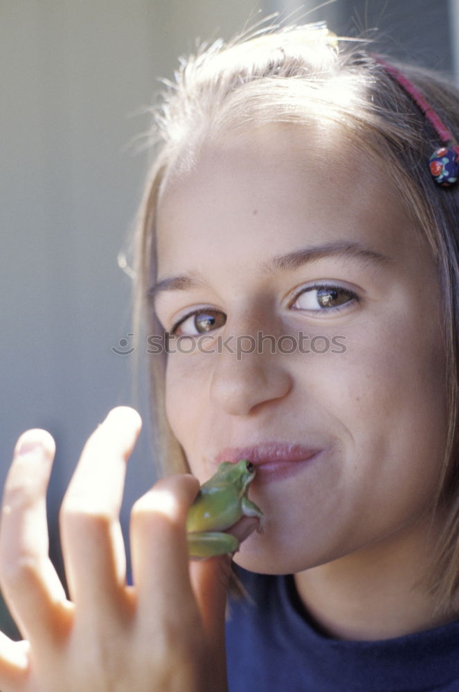 Similar – Image, Stock Photo Happy girl enjoying eating the fresh blueberries