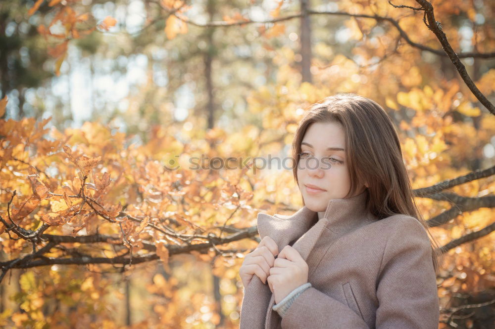 young woman in the autumn forest