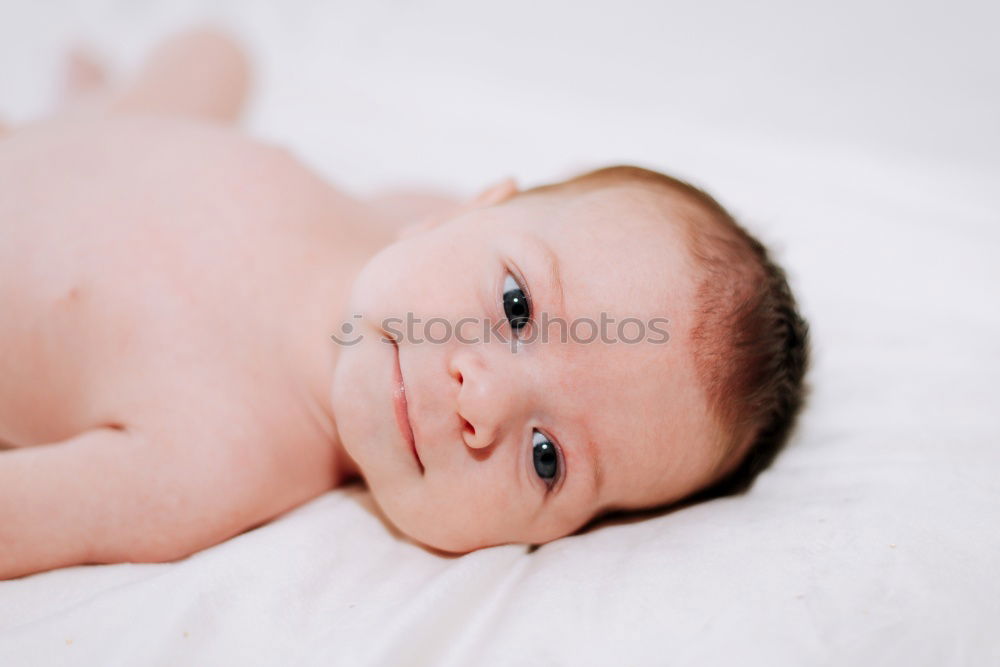 Similar – Image, Stock Photo Newborn baby resting lying above of travel suitcase
