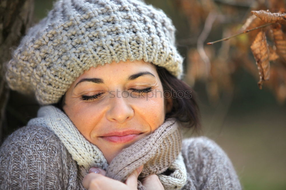 Similar – Woman with cap in cold season