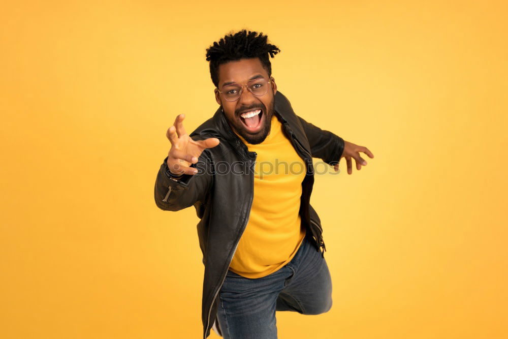 Similar – Image, Stock Photo Portrait of handsome afro man using his mobile.