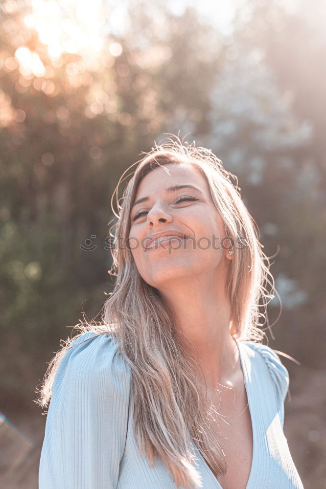 Similar – Image, Stock Photo Expressive model in black posing on nature