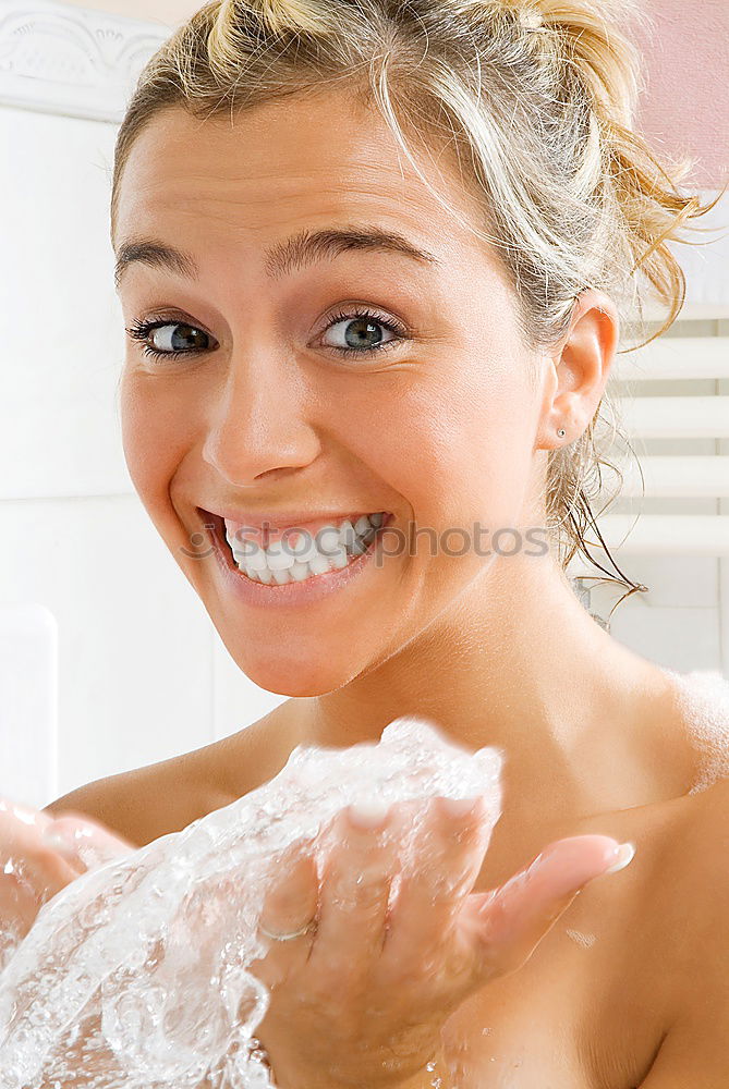 Similar – Playful mischievous woman with wet hair in a towel