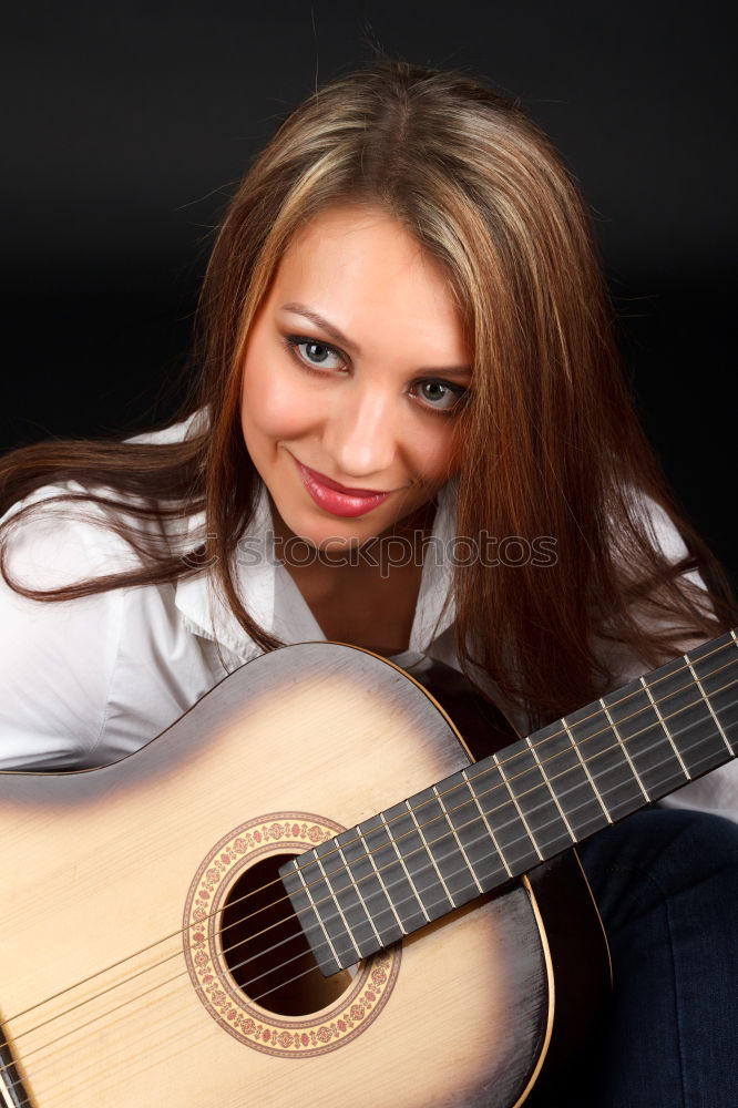 Similar – Schöne Frau, die Gitarre spielt.