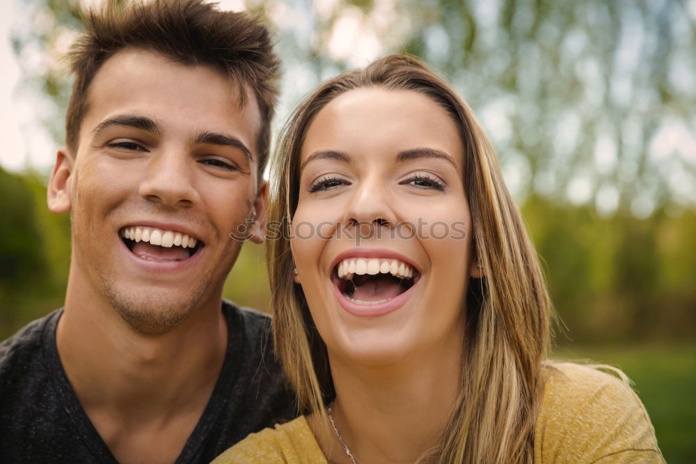 teenagers sitting in the grass