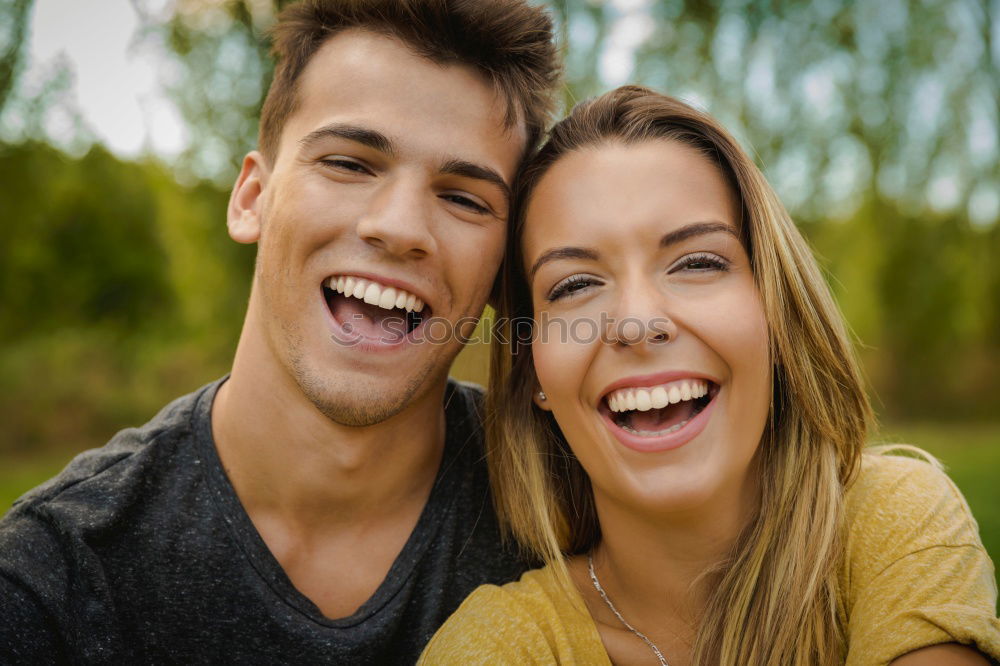 Similar – teenagers sitting in the grass