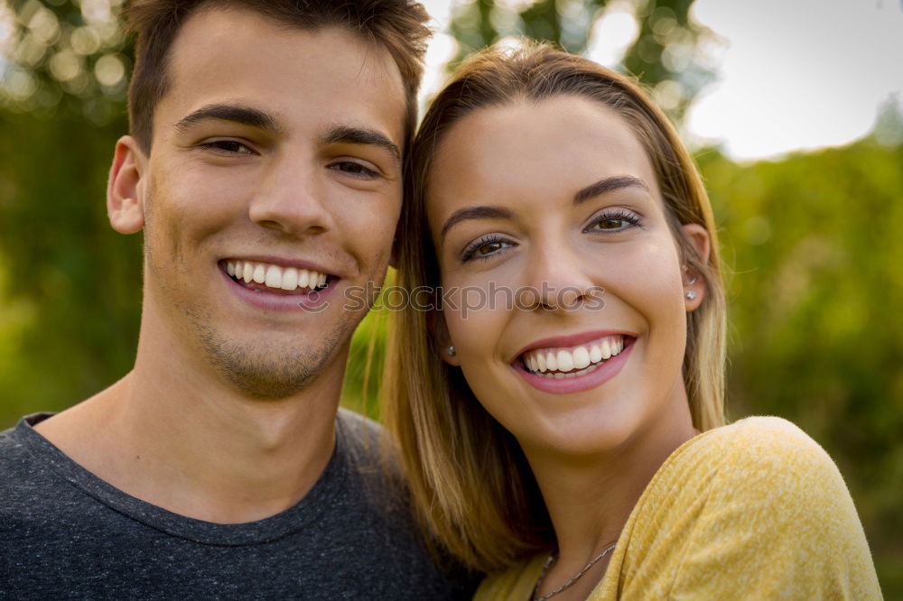 Similar – Image, Stock Photo Beautiful young couple laying on grass in an urban park