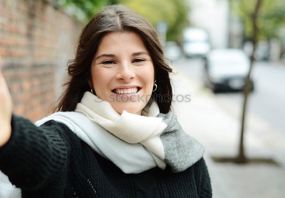 Similar – Smiling Woman in Autumn Fashion Talking on Phone