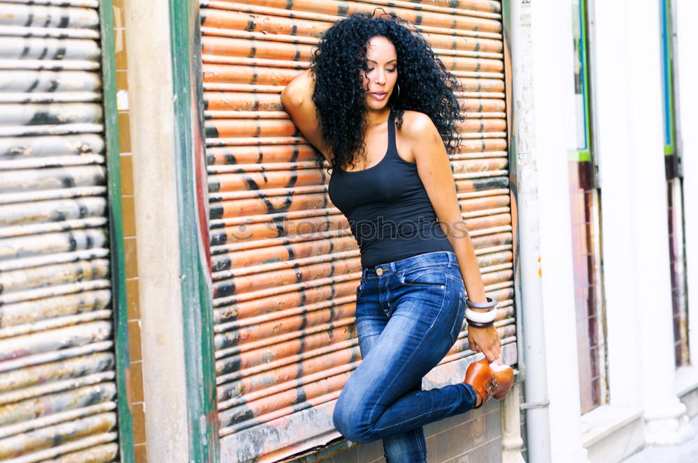 Similar – Image, Stock Photo Young black woman against a urban blind
