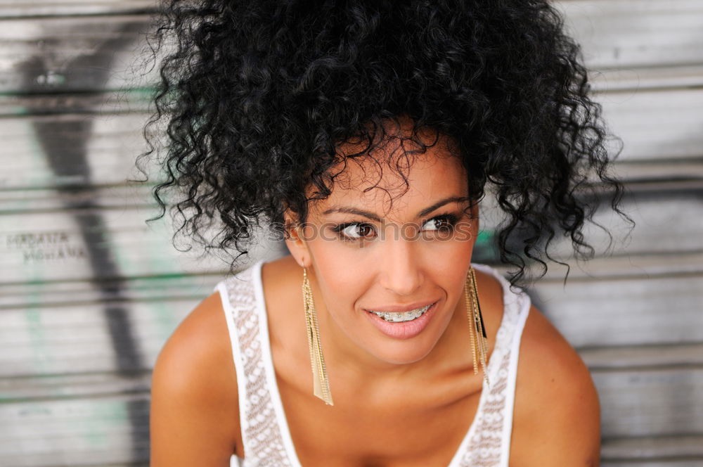 young black woman smiling with braces