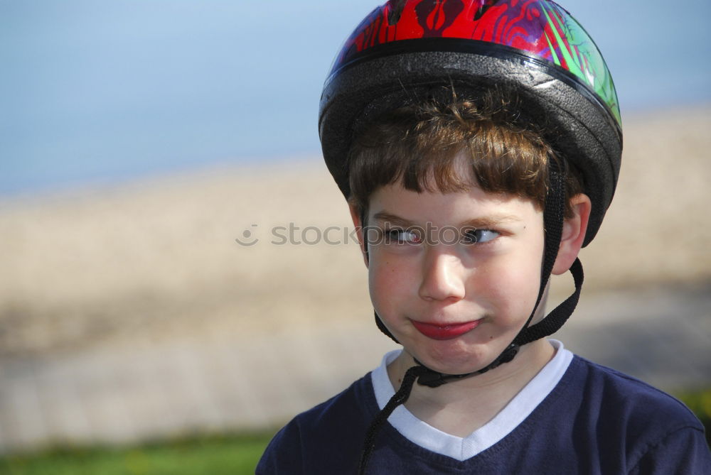 Cool gap | Portrait of a boy with a bicycle helmet and a tooth gap