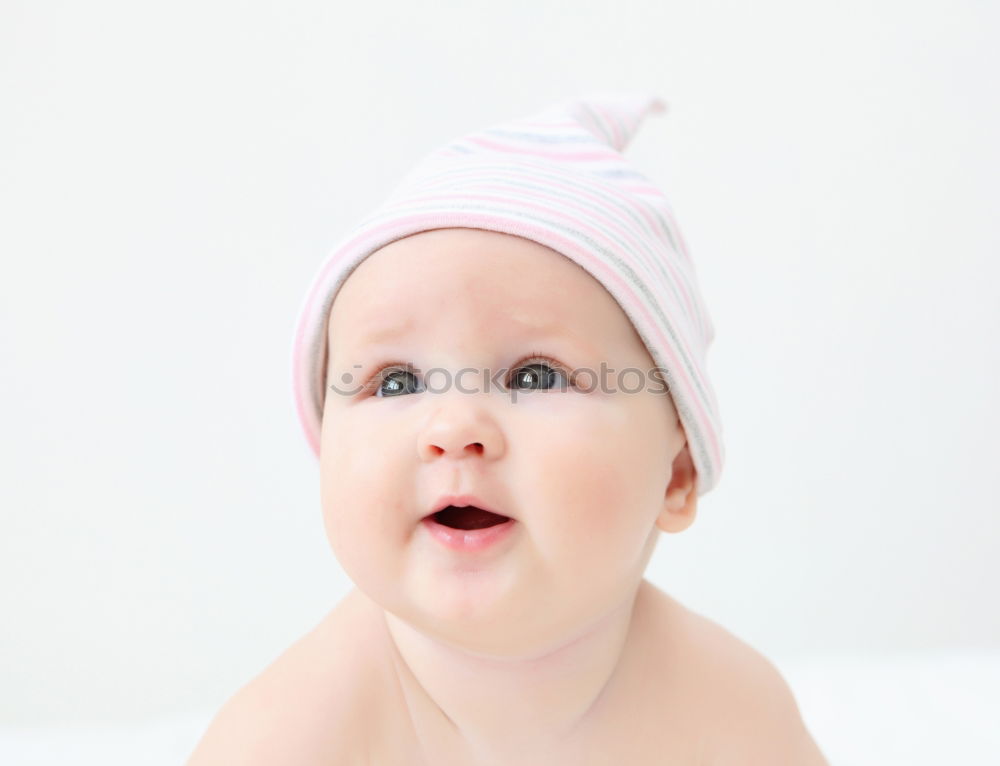 Similar – Little baby girl lying on blanket with colourful polka dots