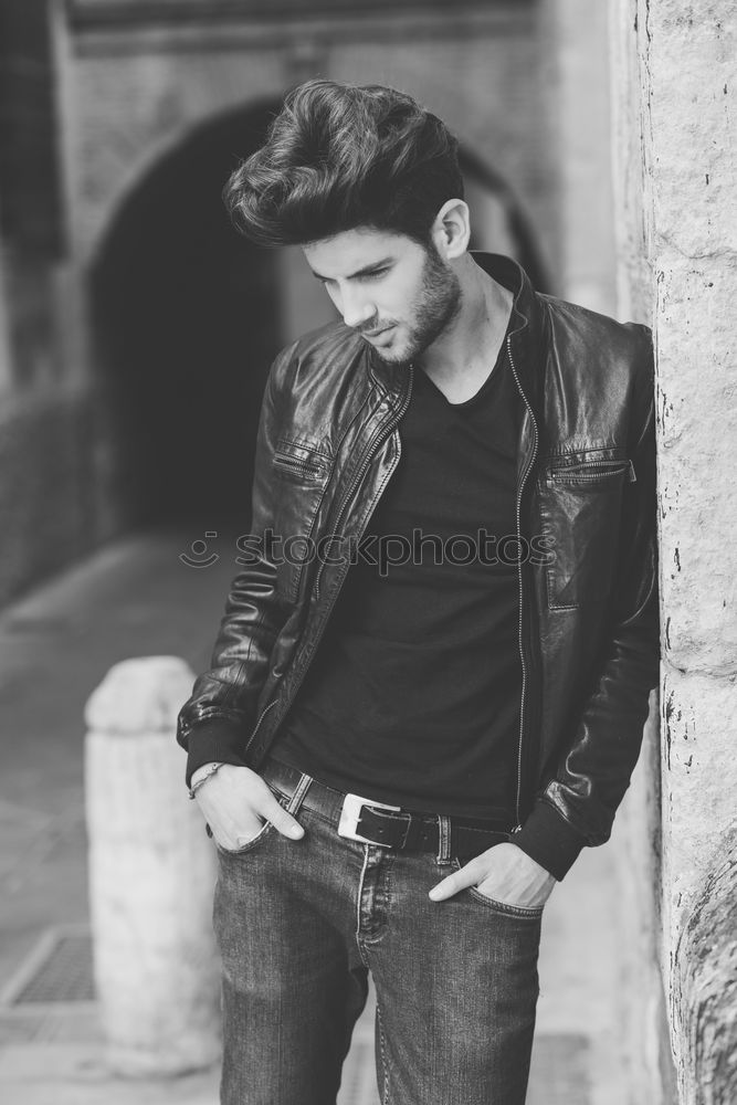 Similar – young man wearing suspenders in urban background