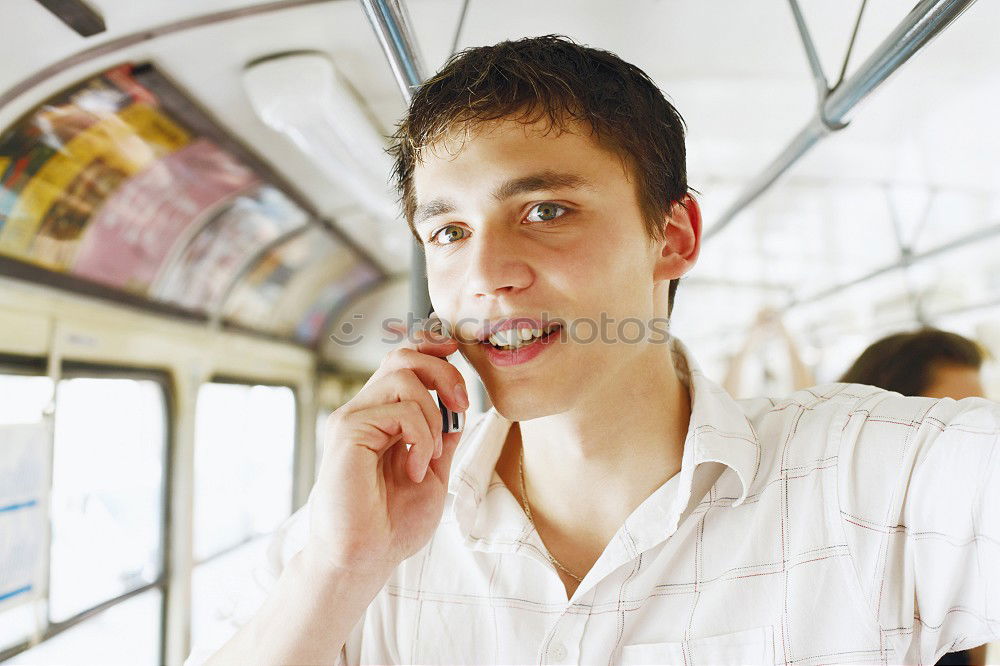 Boy making face with hands on seat