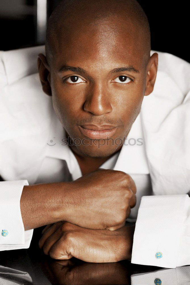 Similar – Handsome black man wearing suit in urban background