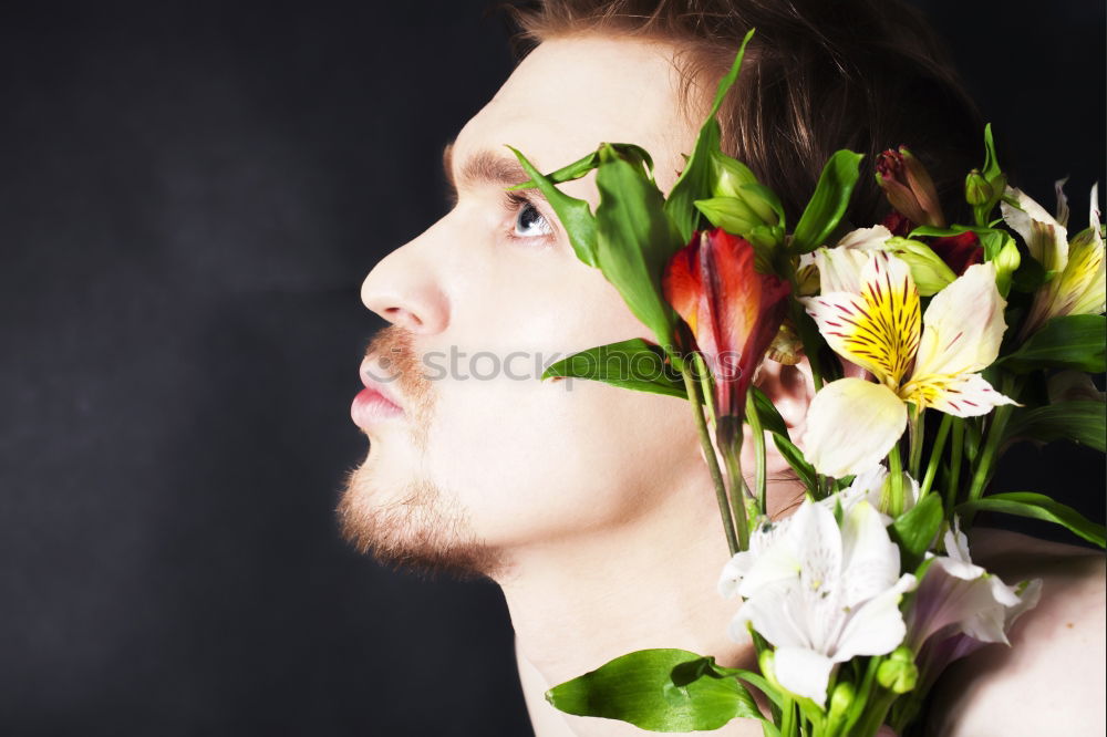 Similar – Image, Stock Photo Woman wrapping Christmas wreath with natural flowers