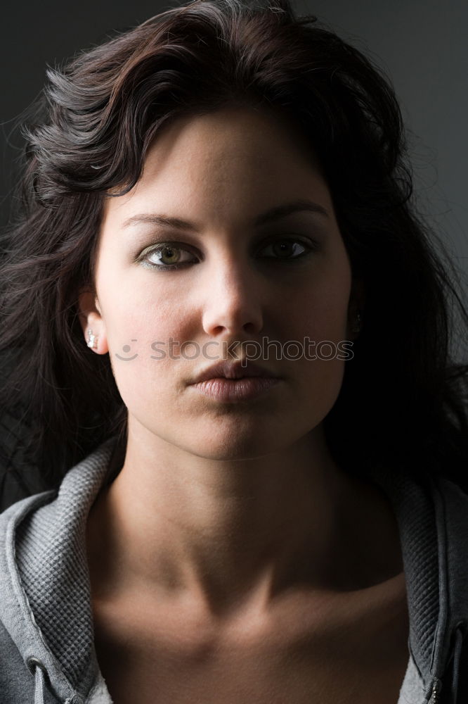 Similar – Portrait of a beautiful girl with big blue eyes looking at camera with surprised expression