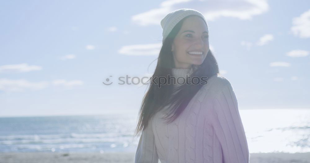 Similar – Woman on the beach in winter