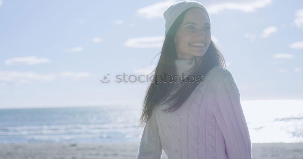 Similar – Woman on the beach in winter