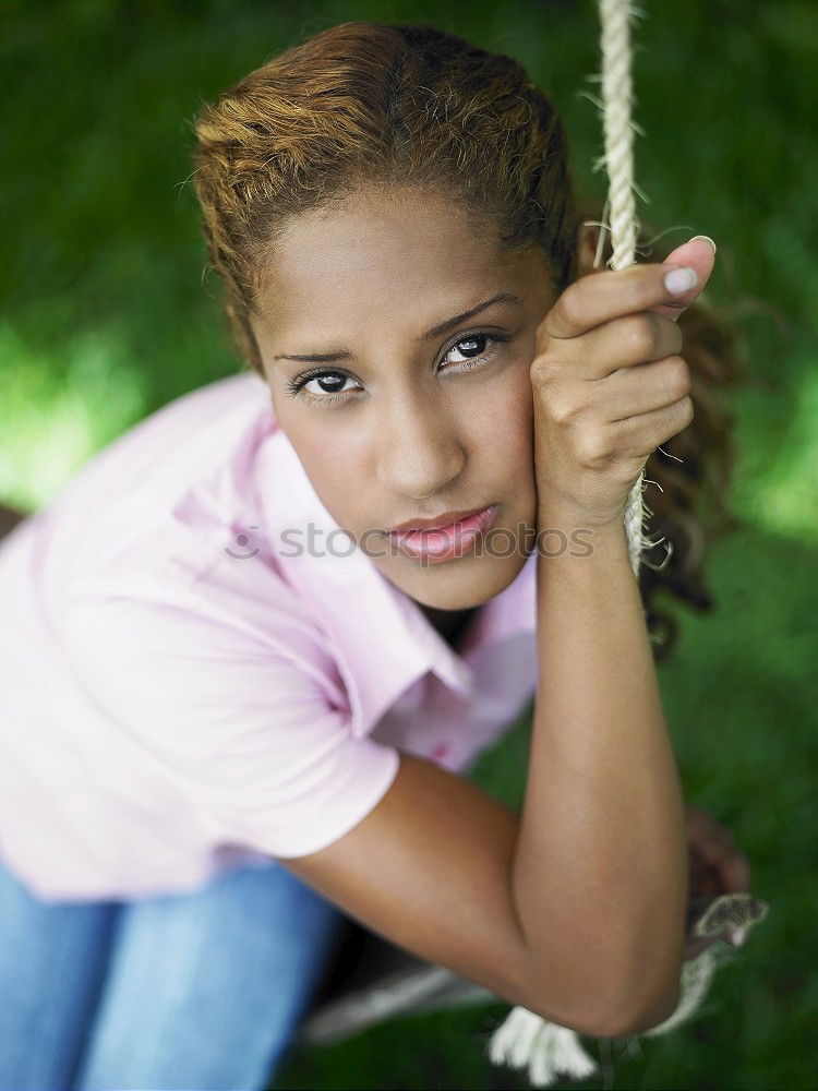 Similar – Image, Stock Photo Mixed woman with afro hairstyle sitting in urban park