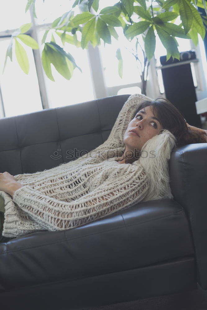 Similar – Image, Stock Photo Young woman resting on armchair