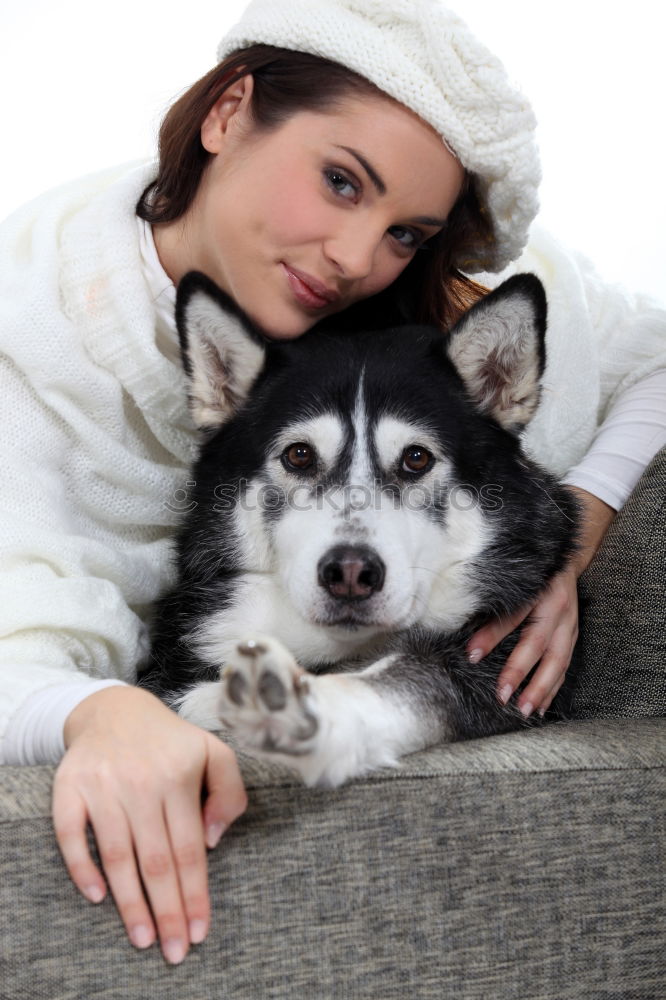 Similar – Young happy woman hugging her dog