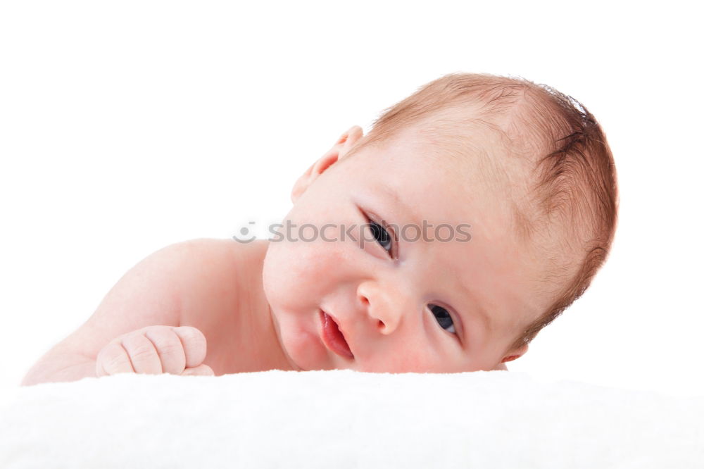 Similar – Cute Baby Girl Lying in the Baby Changer.