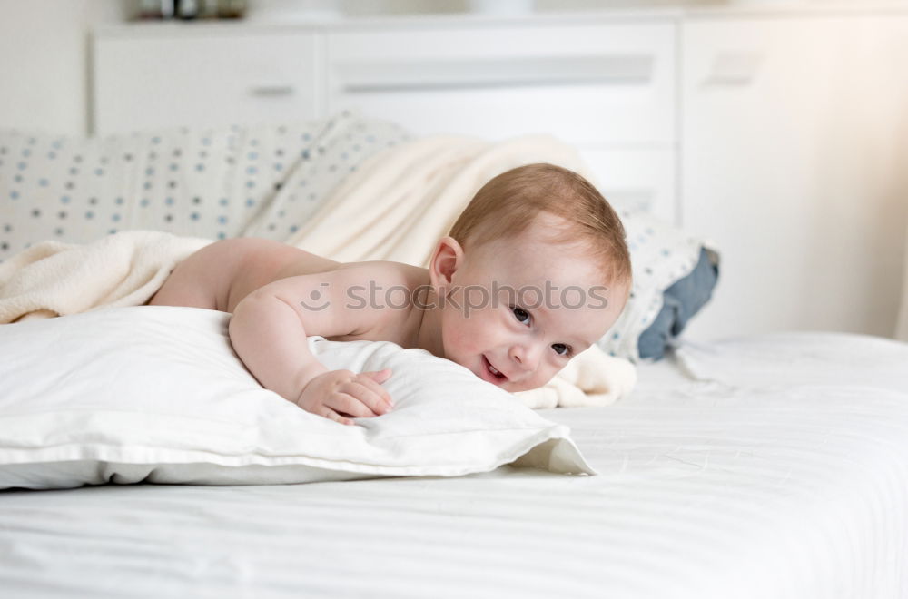 Similar – Cute Baby Girl Lying in the Crib