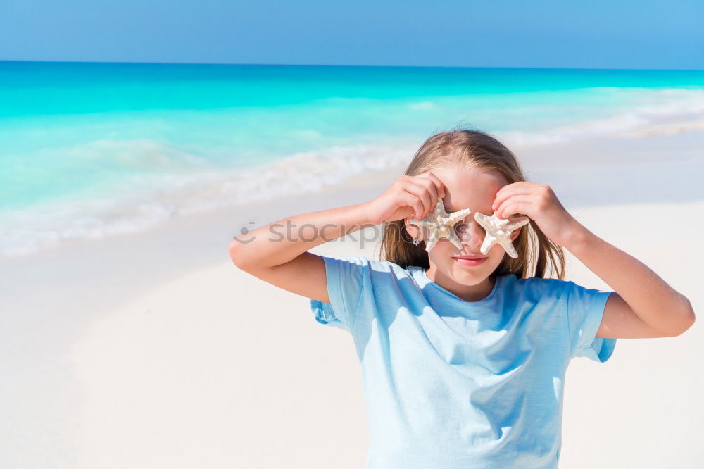 Similar – Image, Stock Photo Child on the beach in summer