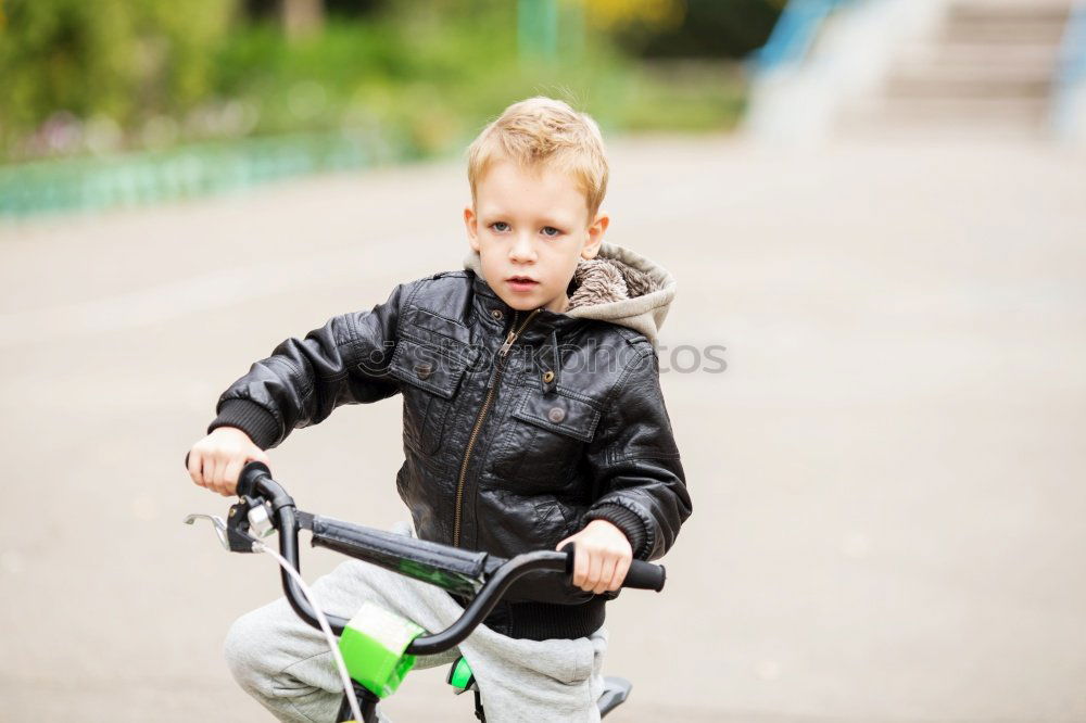 Similar – Five year old child with scooter in the park