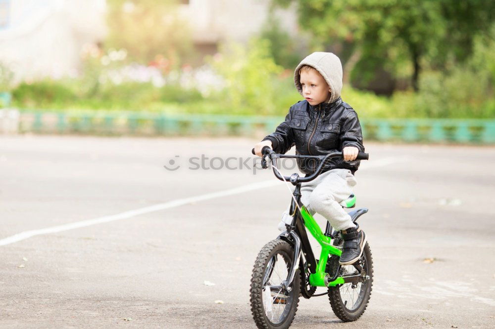 Similar – Five year old child with scooter in the park