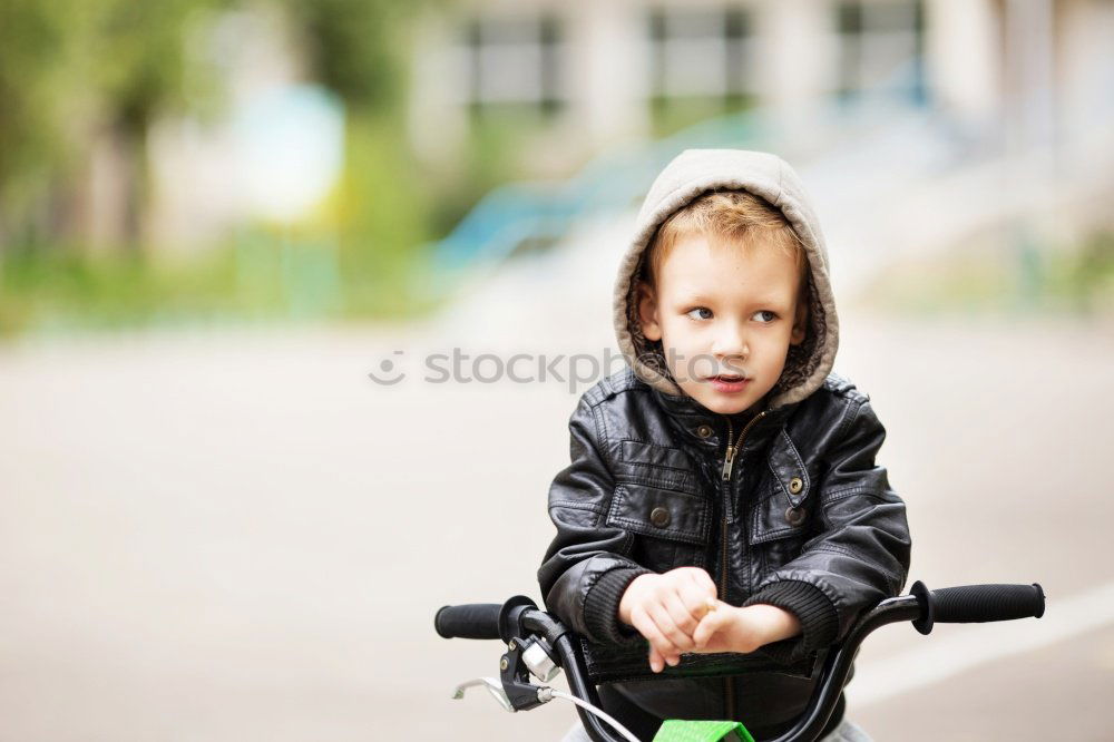 Similar – Cute girl driving bicycle in summer