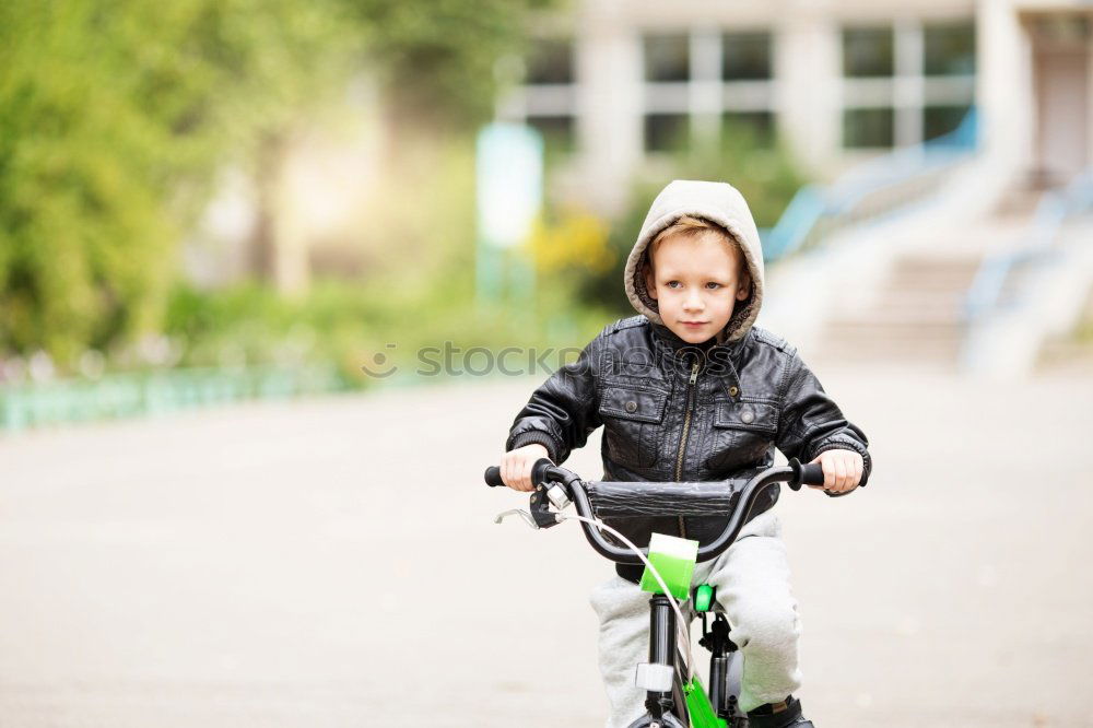 Similar – Cute girl driving bicycle in summer