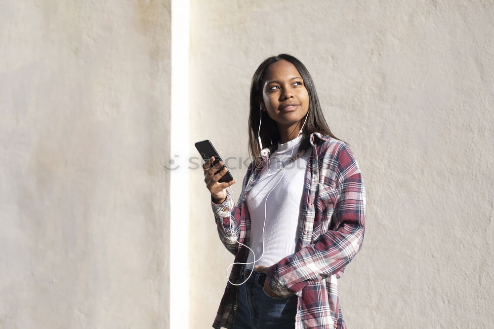 Similar – Image, Stock Photo Young casual woman using her smartphone