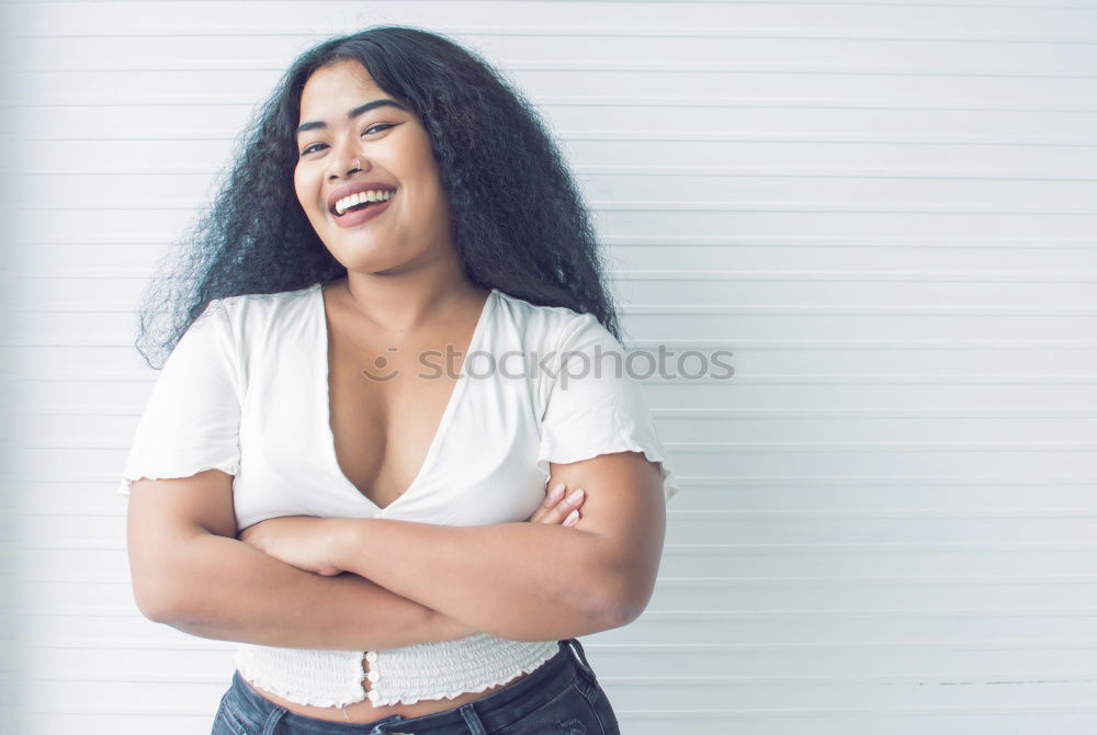 Similar – Smiling young adult woman talking on the phone