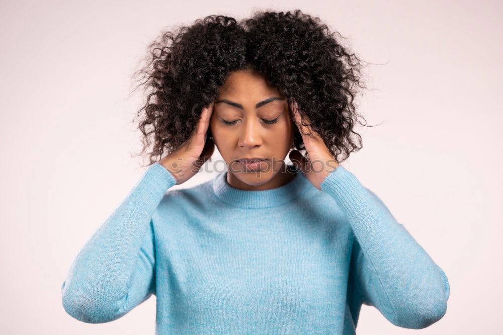 Similar – Portrait of beautiful afro woman covering her face.