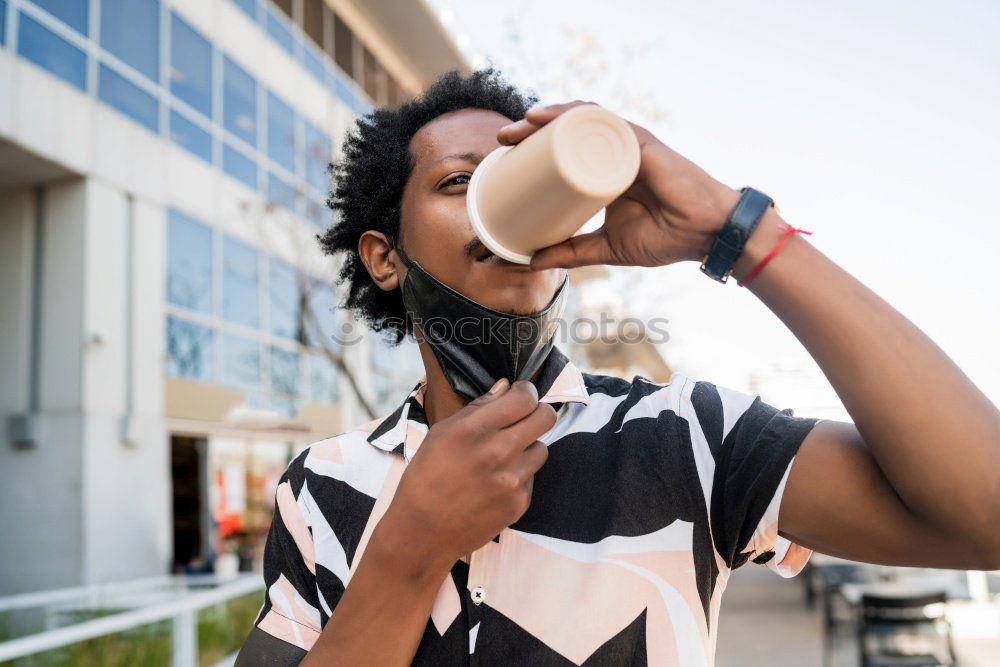 Similar – Handsome afro man relaxing near his bike.