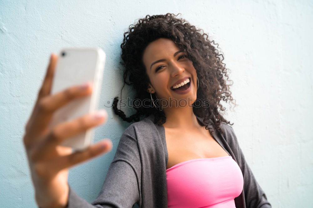 Similar – Image, Stock Photo Young casual woman using her smartphone