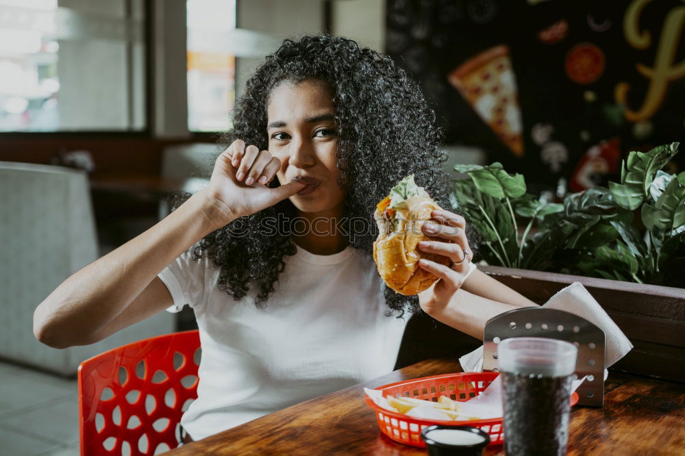 Similar – Young woman in casual clothes drinking a soda.