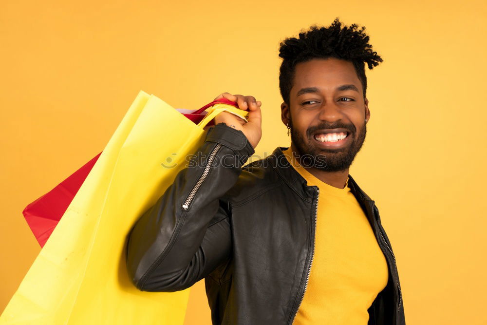 Similar – Image, Stock Photo Portrait of handsome afro man using his mobile.