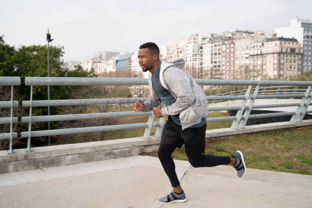 Similar – Image, Stock Photo Attractive black man running in urban background.