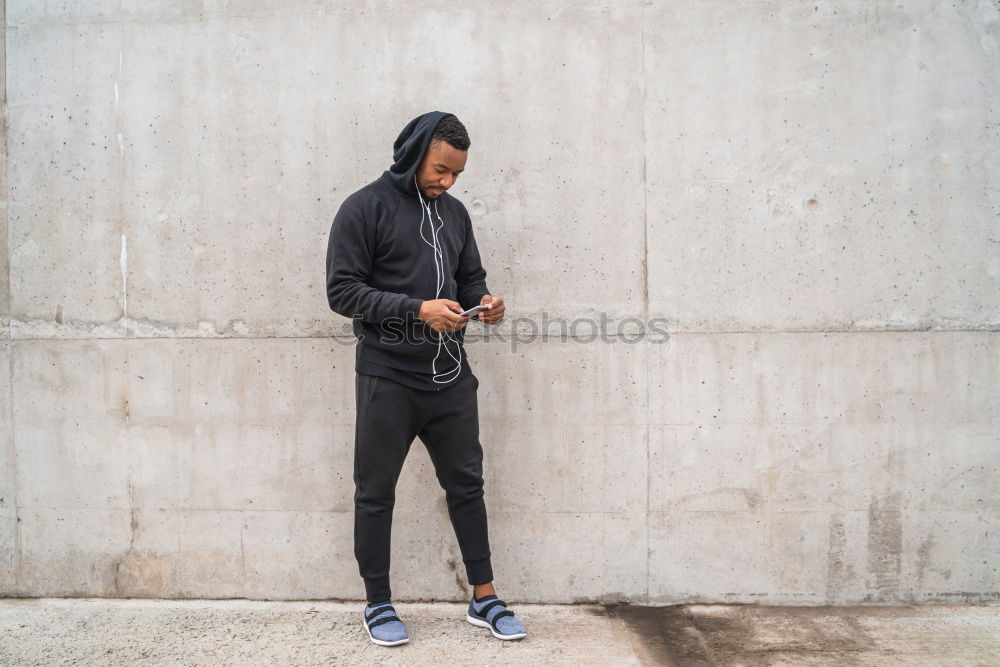 Image, Stock Photo Black man doing stretching after running outdoors