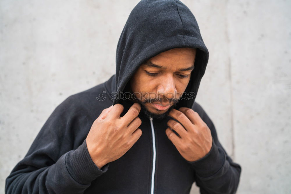 young mulatto man in casual clothes