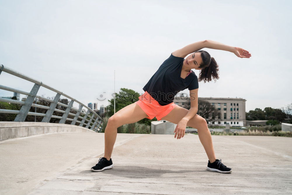 Similar – Young Woman working out outdoors and having fun