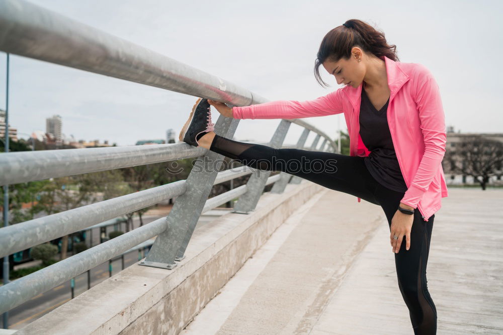 Similar – young woman runner eating an apple