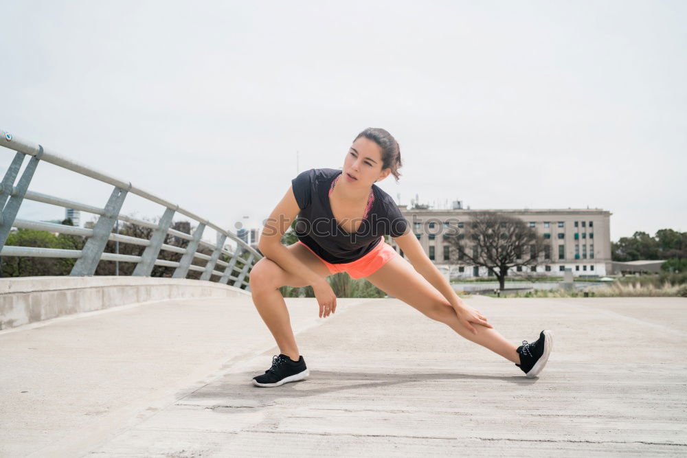 Similar – Young Woman working out outdoors and having fun