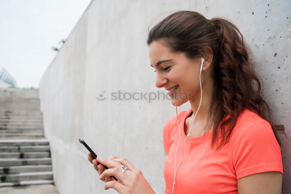 Similar – Image, Stock Photo Sporty young woman sitting on forecourt with her mobile