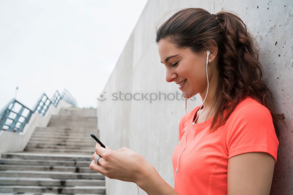 Similar – Image, Stock Photo Sporty young woman sitting on forecourt with her mobile