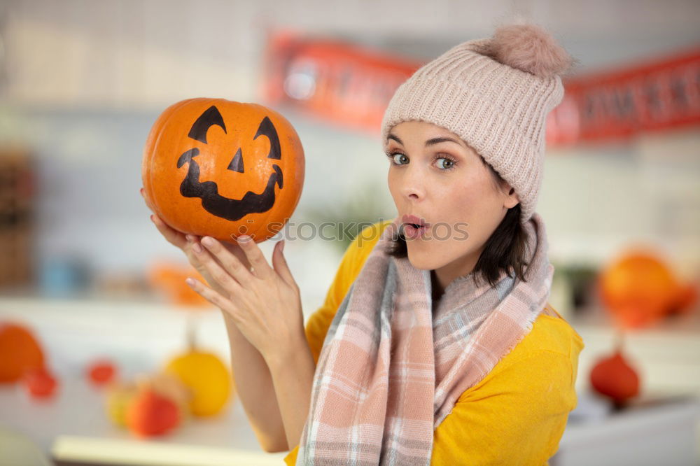 Similar – Image, Stock Photo Little girl holding a pumpkin in her hands, on Halloween.